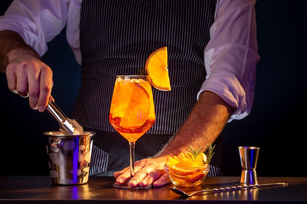 bartender preparing a cocktail at the bar